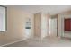 Spacious bedroom with multiple closets and doorways to other rooms at 27113 Robertson Rd, Yalaha, FL 34797
