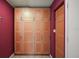 Hallway featuring ample closet space at 27113 Robertson Rd, Yalaha, FL 34797