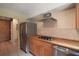Kitchen featuring stainless steel appliances, gas cooktop, and ample storage space at 27113 Robertson Rd, Yalaha, FL 34797