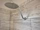 Rainfall shower head inside walk-in shower featuring neutral tile and modern fixtures at 3021 King Palm Dr, New Smyrna Beach, FL 32168