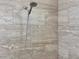 Handheld shower head in tiled walk-in shower featuring modern fixtures at 3021 King Palm Dr, New Smyrna Beach, FL 32168