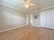Spacious bedroom with light walls, hardwood floors, and ample closet space at 3237 Atwell Ave, The Villages, FL 32162