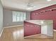 Bedroom with natural light, hard wood floors, and shelving at 3237 Atwell Ave, The Villages, FL 32162