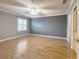 Spacious bedroom featuring a ceiling fan and large window providing natural light at 3237 Atwell Ave, The Villages, FL 32162