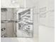 Close up of a bathroom shower with tile detail and a built-in shelf at 3237 Atwell Ave, The Villages, FL 32162