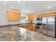 Bright kitchen with stainless steel appliances and granite countertops at 3331 Overland Ter, The Villages, FL 32163