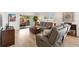 Cozy living room with comfortable seating and a view of the outdoor patio at 3331 Overland Ter, The Villages, FL 32163