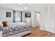 Bright bedroom with a TV, ceiling fan, and closet, offering ample space and storage at 38314 Echols Rd, Leesburg, FL 34788