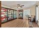 Inviting living room with hardwood floors and display cabinets that enhance the space at 38314 Echols Rd, Leesburg, FL 34788
