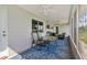 Spacious screened porch with outdoor seating, a ceiling fan, and serene views at 38314 Echols Rd, Leesburg, FL 34788