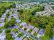 An aerial view showcasing the property's location among golf course and neighborhood amenities at 409 Westwood Dr, Leesburg, FL 34748