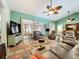 Spacious and inviting living room area with comfortable seating and plenty of natural light at 4800 Tara View Rd, Leesburg, FL 34748