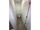 Small bathroom with a toilet and tile flooring, offering a functional space at 4957 Kaia Ave, Winter Haven, FL 33884