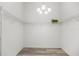 Spacious walk-in closet with white wire shelving and overhead lighting at 5068 Ne 121St Ave, Oxford, FL 34484