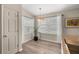 Bright dining nook with large windows and pendant lighting at 5068 Ne 121St Ave, Oxford, FL 34484