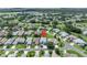 Aerial view of a residential area showing the property's location within the community, indicated by a red marker pin at 5964 Brittania Blvd, Tavares, FL 32778