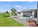Picturesque backyard showcasing patio and manicured landscaping at 5964 Brittania Blvd, Tavares, FL 32778