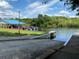 Community boat ramp, boat house, and dock on a sunny day at 6008 Apex Way, Lady Lake, FL 32159