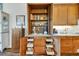Custom kitchen cabinets with slide out shelving and storage at 6008 Apex Way, Lady Lake, FL 32159