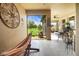 Relaxing screened-in porch with a hammock and serene views of the backyard at 6008 Apex Way, Lady Lake, FL 32159