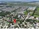 This aerial view showcases the home's neighborhood location near Old Canoe Creek Rd and the FL Turnpike at 604 Ponderosa Dr, St Cloud, FL 34769