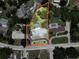 This aerial view highlights the expansive property layout, pool, and surrounding trees at 604 Ponderosa Dr, St Cloud, FL 34769