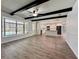 Spacious living room and kitchen combo featuring new flooring and view of the pool at 604 Ponderosa Dr, St Cloud, FL 34769