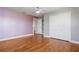 Bedroom with hardwood floors, double closets, fresh paint and natural light at 637 Neptune Dr, Groveland, FL 34736