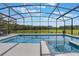 Beautiful in-ground pool with a screened-in lanai and stunning backyard views at 637 Neptune Dr, Groveland, FL 34736