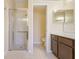 Bathroom featuring a glass enclosed shower and a vanity with nice cabinets at 645 Highlands Hammock Dr, Kissimmee, FL 34759