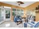 Cozy living room showcases comfortable seating and ample natural light, ideal for relaxation at 645 Highlands Hammock Dr, Kissimmee, FL 34759