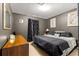 Comfortable bedroom featuring neutral walls and large dresser at 70 Locust Pass Run, Ocala, FL 34472