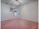 Bedroom featuring ceiling fan and carpeted floor at 712 Old Oaks Ln, Leesburg, FL 34748