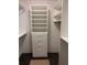 Organized walk-in closet with built-in shelving and drawers for optimal storage at 724 Rosemere Cir, Orlando, FL 32835