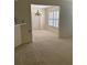 Dining room with carpet flooring and a chandelier, offering an inviting space at 724 Rosemere Cir, Orlando, FL 32835