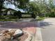 Community entrance sign for Lake Rose Pointe with mature trees and landscaping at 724 Rosemere Cir, Orlando, FL 32835