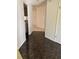Welcoming entryway featuring dark tile flooring and views into the home's interior at 724 Rosemere Cir, Orlando, FL 32835