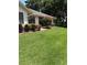 Well-maintained lawn and landscaping, showcasing the home's curb appeal at 724 Rosemere Cir, Orlando, FL 32835
