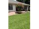 Manicured lawn and landscaping enhance this house's curb appeal at 724 Rosemere Cir, Orlando, FL 32835