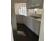 Bright kitchen with modern appliances, granite countertops, and a sleek cooktop at 724 Rosemere Cir, Orlando, FL 32835
