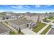Aerial view of a single-Gathering home featuring well-manicured landscaping, a two car garage, and a large yard at 733 Citrus Reserve Blvd, Davenport, FL 33837