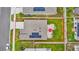 Aerial view of home's layout, highlighting the backyard, solar panels, and landscaping at 733 Citrus Reserve Blvd, Davenport, FL 33837