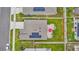 Bird's-eye view of a well-kept backyard with a cozy patio and solar panels on the roof at 733 Citrus Reserve Blvd, Davenport, FL 33837