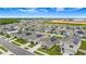 Panoramic aerial view of a neighborhood featuring solar panels, manicured lawns, and well-maintained streets at 733 Citrus Reserve Blvd, Davenport, FL 33837