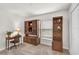 Quiet bedroom with a desk, dark wood furniture, and carpeted floors at 733 Citrus Reserve Blvd, Davenport, FL 33837