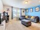 Comfortable living room with a sectional sofa and decor at 8800 Corcovado Dr, Kissimmee, FL 34747