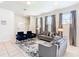 Comfortable living room with a neutral palette, and tile flooring at 8800 Corcovado Dr, Kissimmee, FL 34747