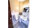Bathroom with a sink, mirrored cabinet, and decorative tiles at 100 W Idlewild Ave, Eustis, FL 32726