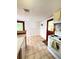 Bright kitchen with classic tile flooring and easy access to the outdoors at 100 W Idlewild Ave, Eustis, FL 32726
