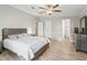 Spacious main bedroom includes an ensuite bathroom and large windows for natural light at 1005 Richard Dr, The Villages, FL 32159
